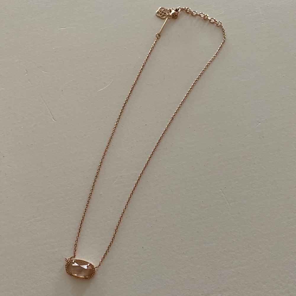 Kendra Scott rose gold necklace/rose gold stone